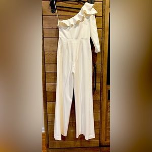 It’s a white Jay Godfrey jumpsuit in size 4